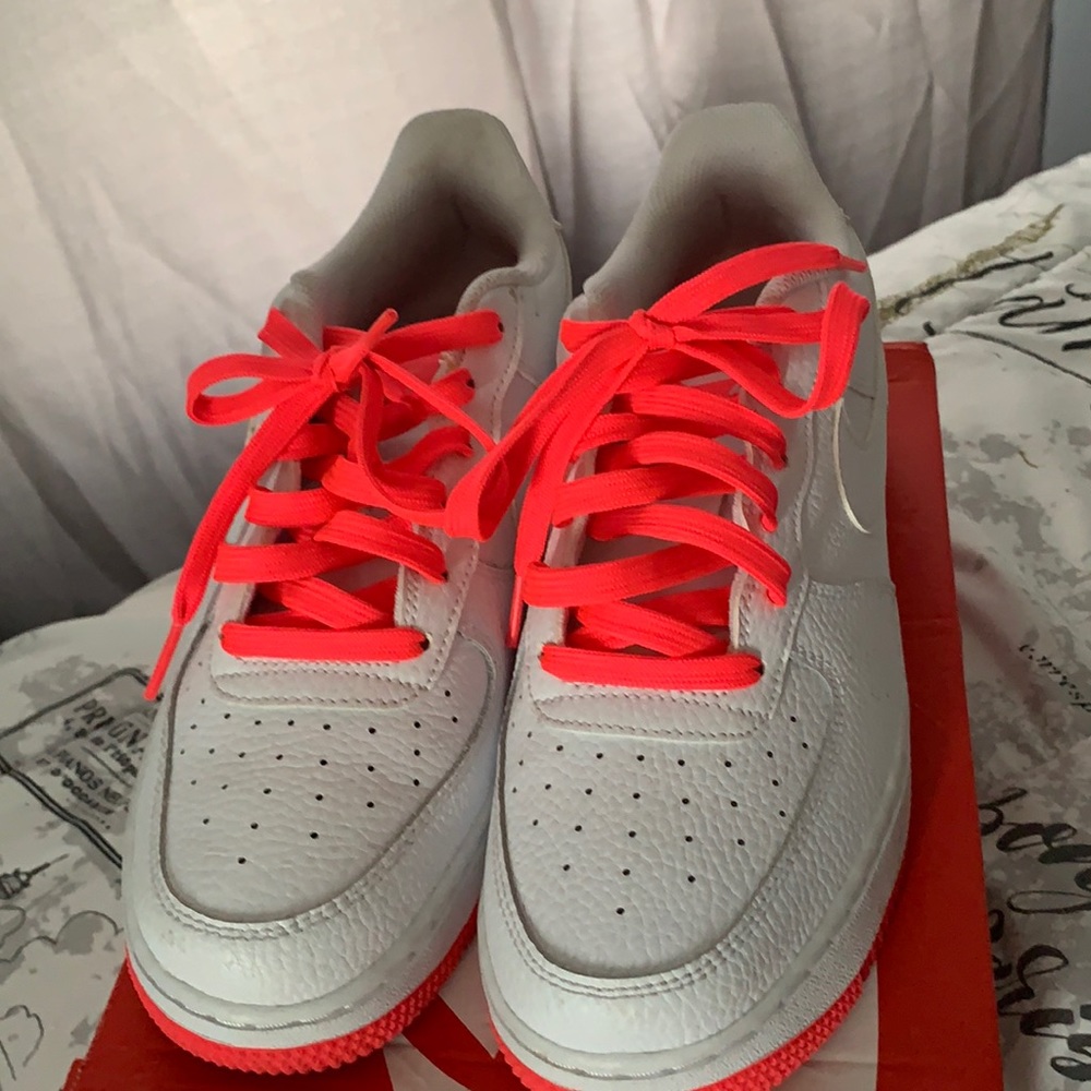 Neon pink and white AF 1’s